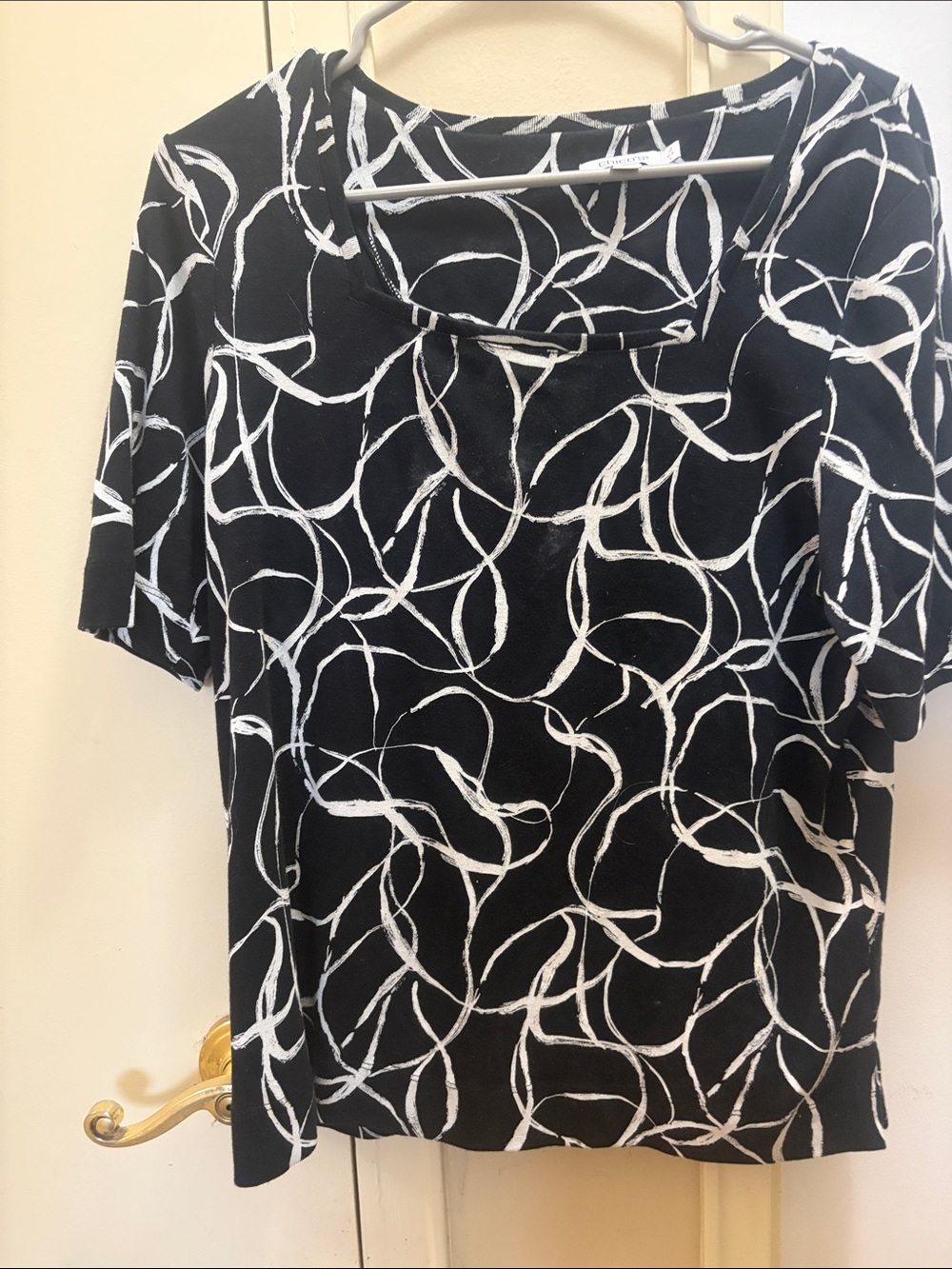 Chico's Black Short Sleeve Top with White Abstract Swirl Print